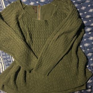 Maurice’s green sweater with a gold sparkle in the thread. Zipper on back Size 3